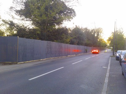 150424 Syon Lane hoarding and jogger